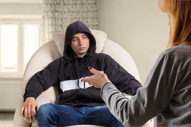 Mother and teenage boy having an argument.