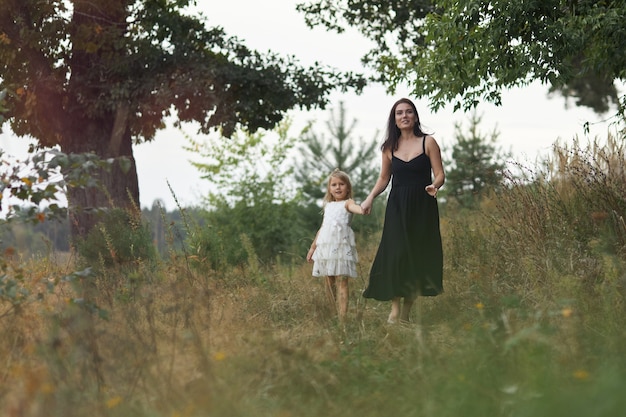 Mother with daughter walk