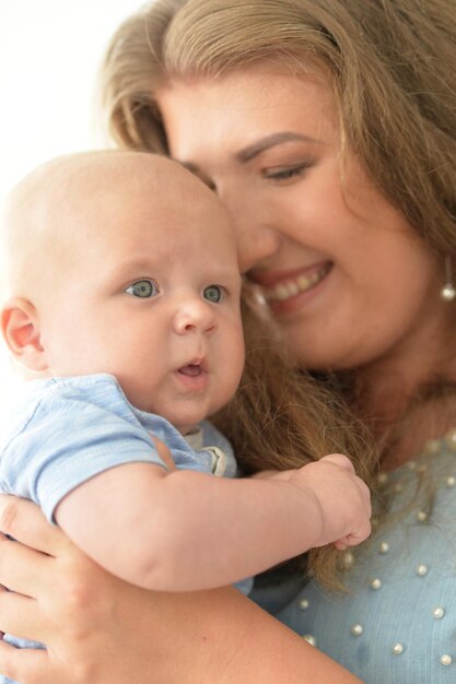 Mother with her baby boy close up portrait