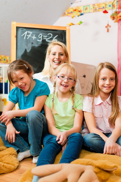 Mother with schoolchildren