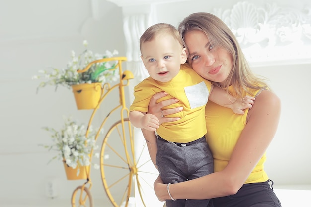 mother with a small child toddler / two family mother and child motherhood, health with happiness