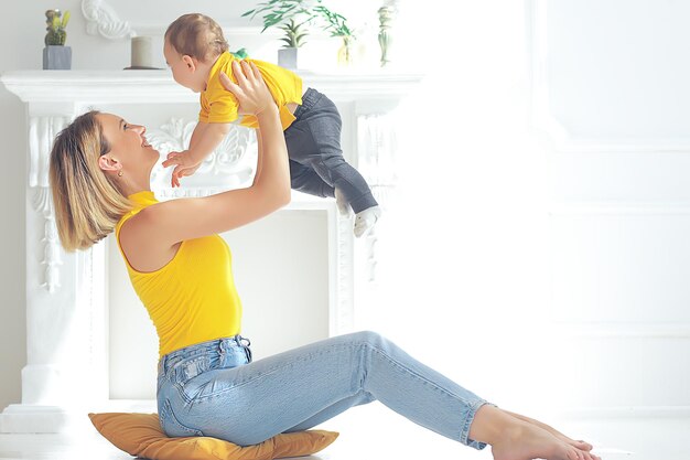 mother with a small child toddler / two family mother and child motherhood, health with happiness