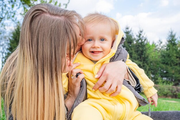 Motherly love and warmth shared in a spring park