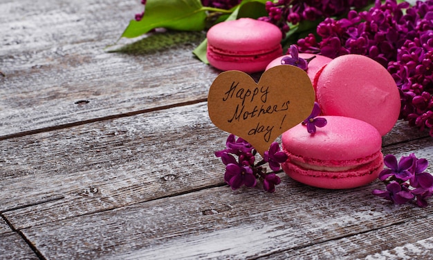 Mothers day background with  macaroons and lilac