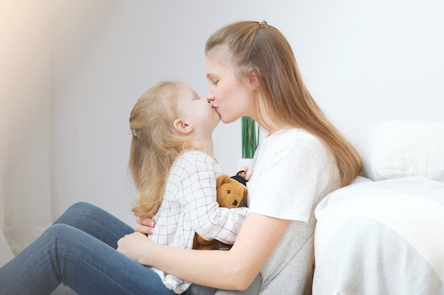 Mothers day concept mom and daughter at home