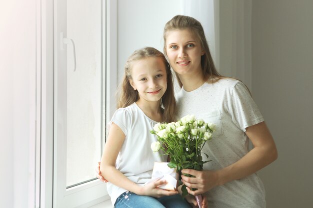 Mothers day concept mom and daughter at home