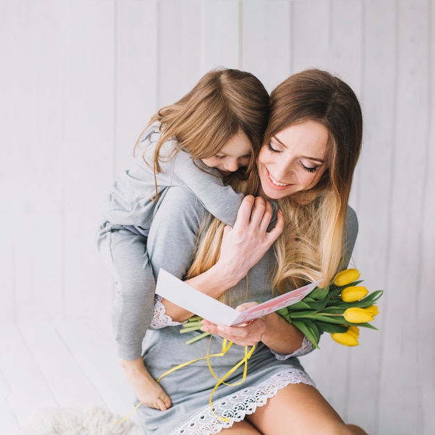 Mothers day concept with loving mother and daughter