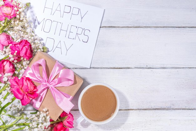 Mothers day gift and flowers background