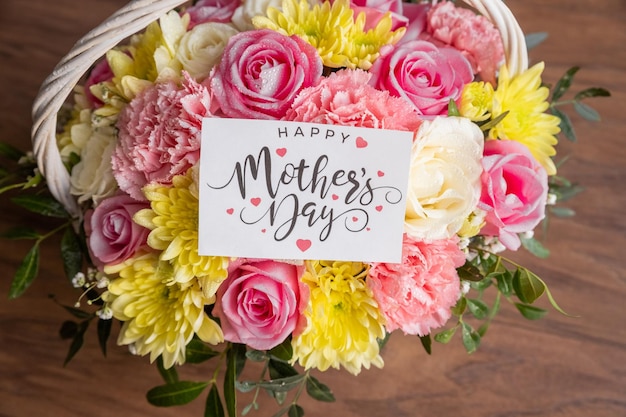 Mothers day greeting card Beautiful blooming flowers in basketCreative bouquet with chrysanthemums roses carnationshappy mothers day floral present