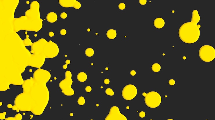Photo motion abstract yellow liquid spots, black splash background