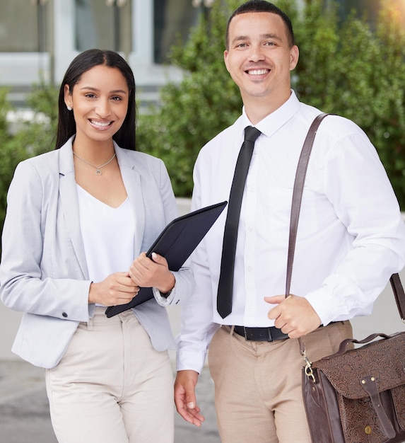 Motivation collaboration and teamwork with a business woman and man in the city working together on a startup company Portrait of a corporate professional team ready for future growth outside