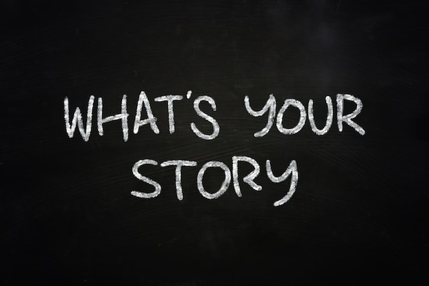 Motivational concept the words What is Your Story written with chalk on blackboard