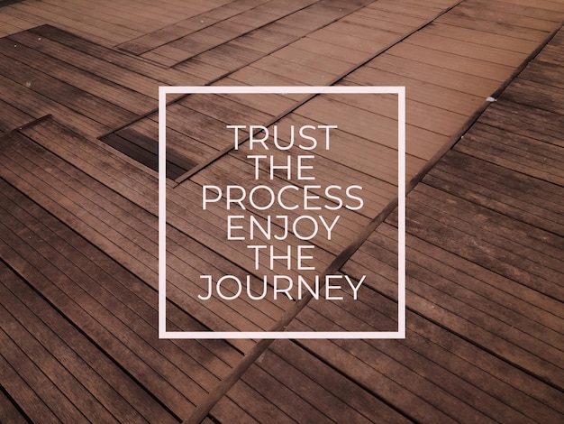 Motivational and inspirational quote with phrase TRUST THE PROCESS ENJOY THE JOURNEY
