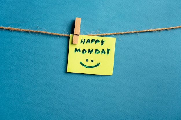 Photo motivational and inspirational text  on hanging paper note