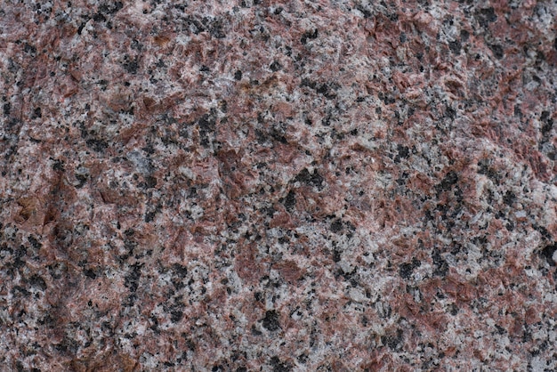 motley texture background of granite stone