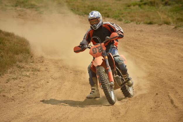 Photo motocross bike in a race representing concept of speed and power in extreme man sport