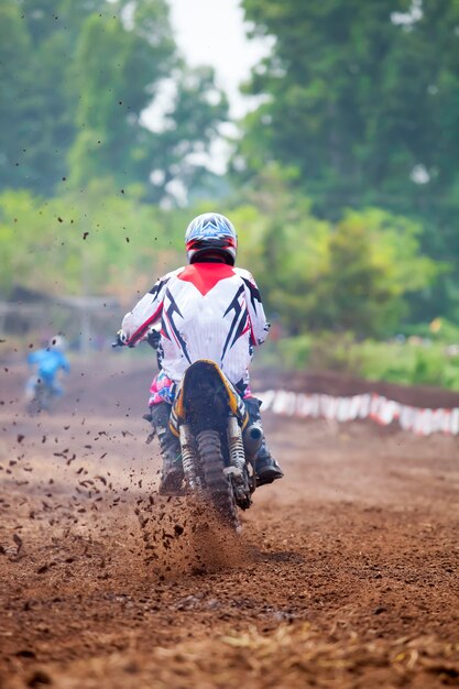 Motocross riders are doing the speed in the race.