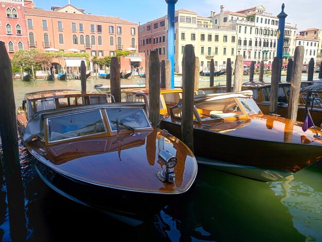 Motor boats in the water parking in Venice Italy