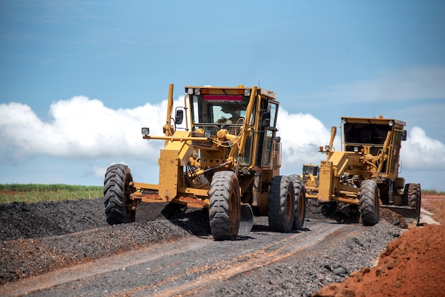 Photo motor grader civil construction improvement base road work