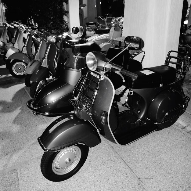 Photo motor scooters parked at parking lot