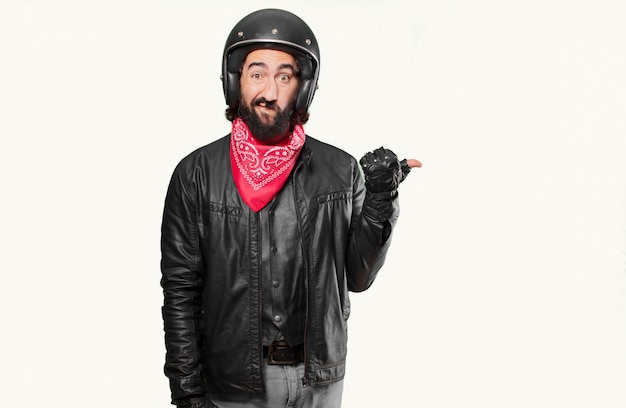 Motorbike rider pointing sign