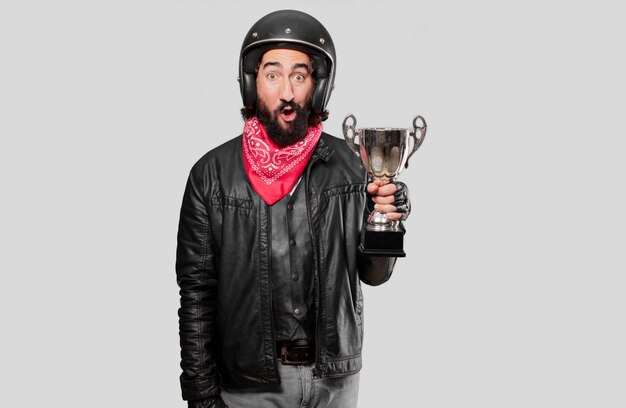 Motorbike rider winnig a trophy