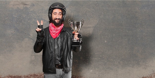 Photo motorbike rider winnig a trophy