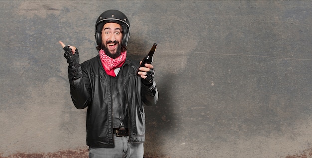 Motorbike rider with a beer bottle