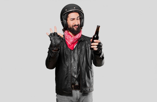 Motorbike rider with a beer bottle