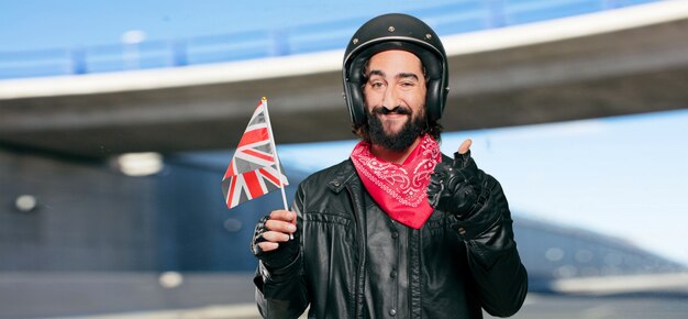 Мотоциклист с флагом Англии