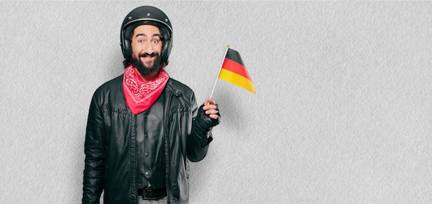 ドイツの国旗とバイクのライダー