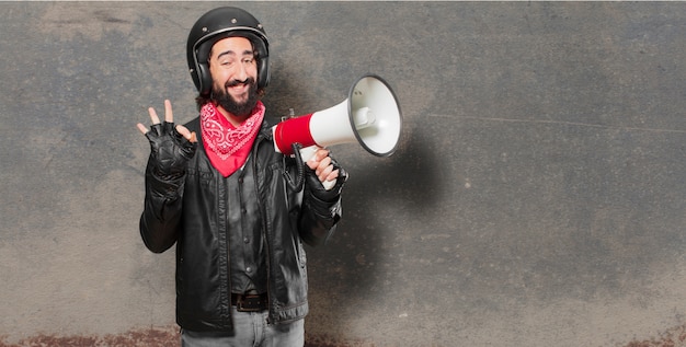 Motorbike rider with a megaphone