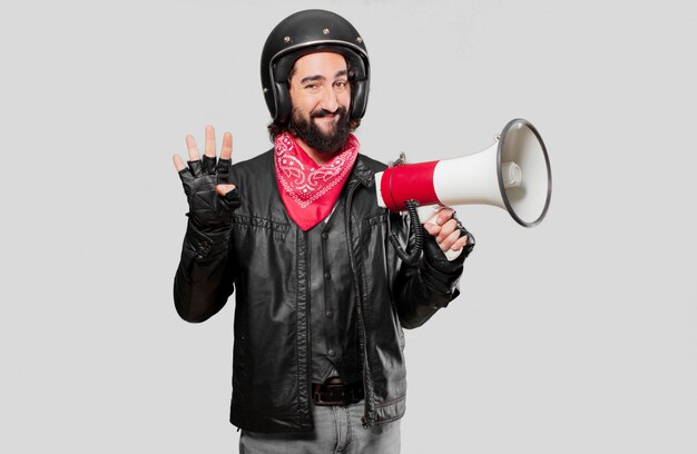 Motorbike rider with a megaphone