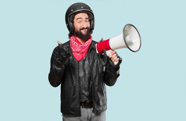 Motorbike rider with a megaphone