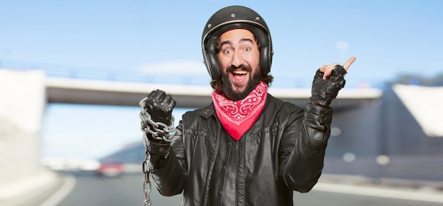 Motorbike rider with a steel chain