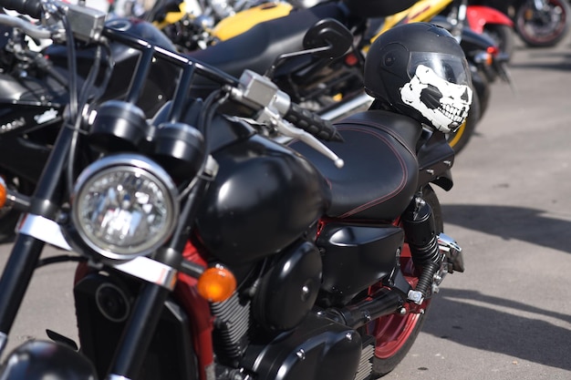 A motorbike on the show with chrome details and other parts, closeup with depth of field openair