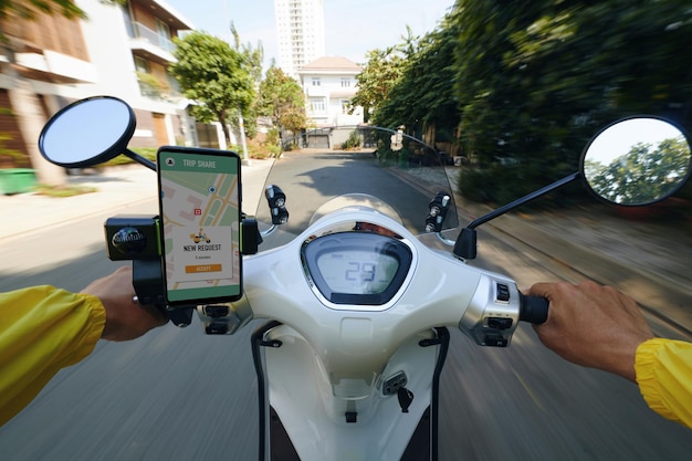 Motorbike taxi driver riding fast