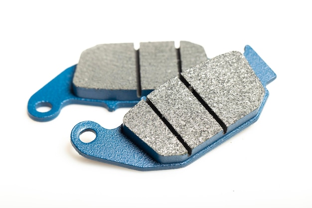 Motorcycle brake pads isolated on white background closeup image