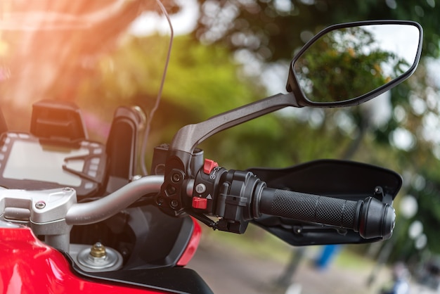 Photo motorcycle handlebar with button control  and mirror