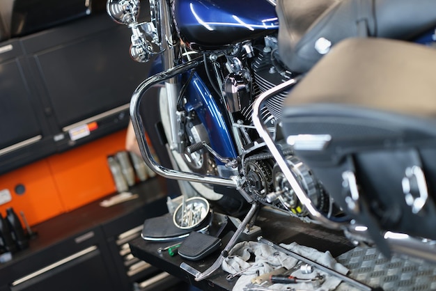 Motorcycle and parts in the garage kitchen blurry