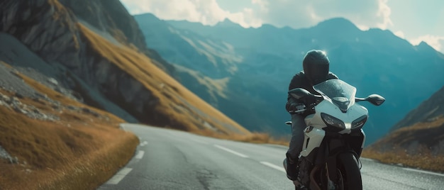 a motorcycle with a mountain range in the background