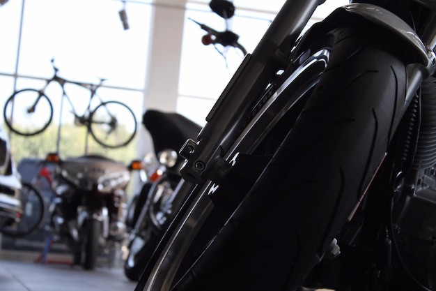 Motorcycles and bikes in a dealership showroom