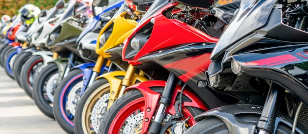 Motorcycles group parking on city street in summer