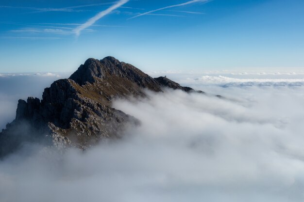 Mount Alben on the Orbie Alps above a sea of clouds