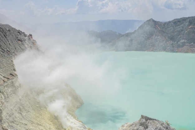 Mount Ijen Volcanic Crater blue fire and lake when day time