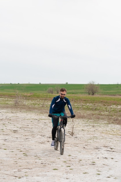 Mountain biker rides in nature