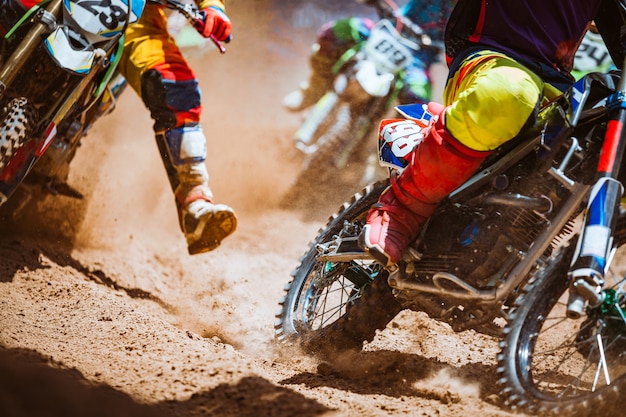 Mountain bikes race in dirt track