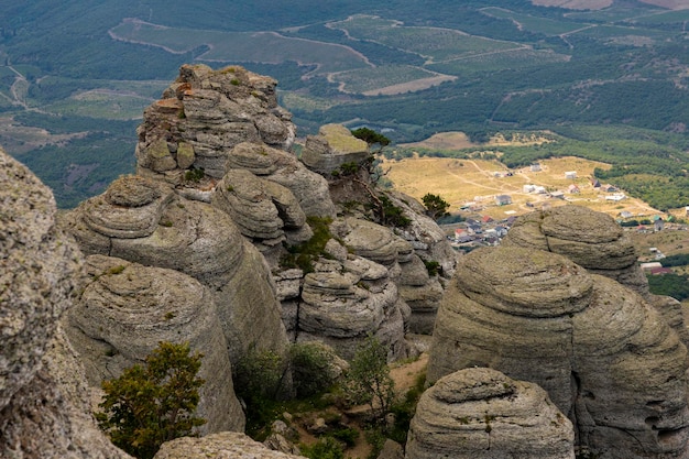 Mountain canyon gray limestone cliffs in the form of pillars formed under the action of natural forces