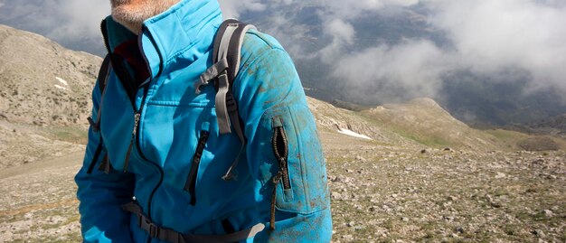 Mountain climber in blue coat