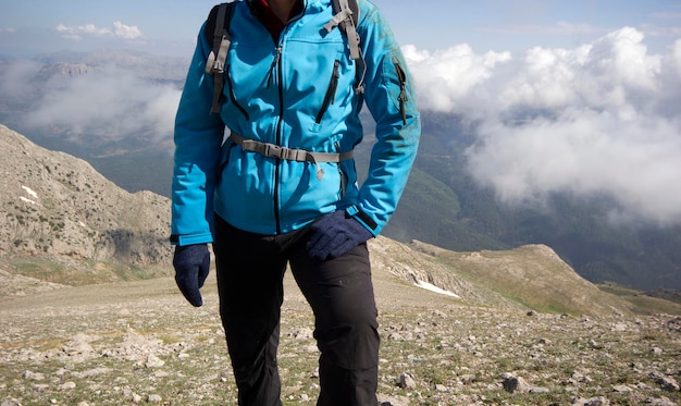 Mountain climber in blue coat